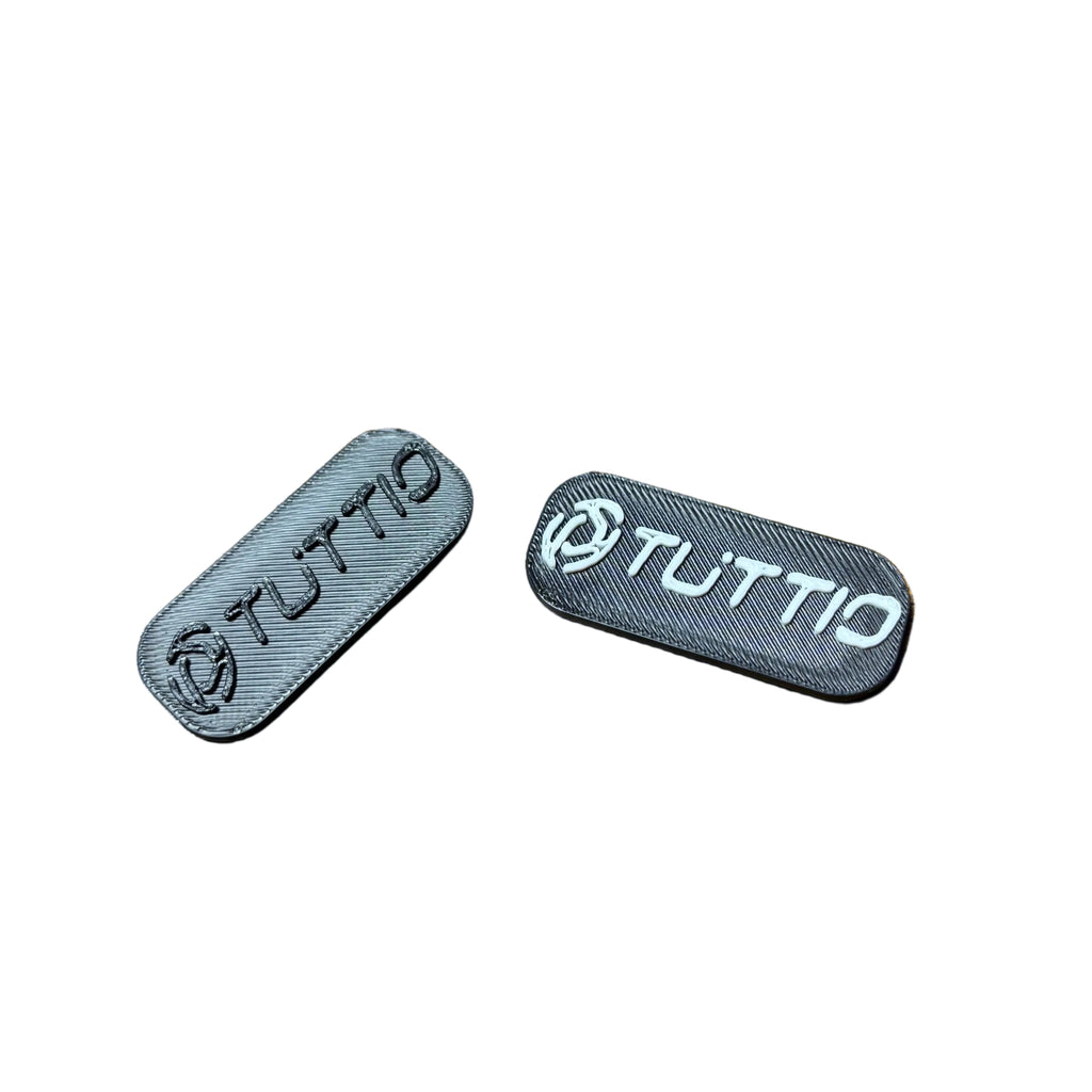 Surron lid badge